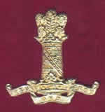 The cap badge of the 11th Hussars (PAO) 